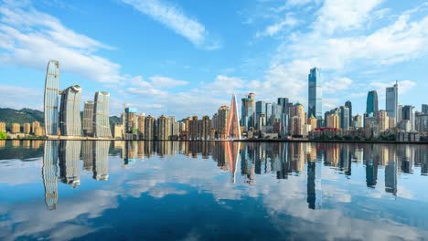 panoramic city skyline and modern commercial buildings with water reflection in chongqing