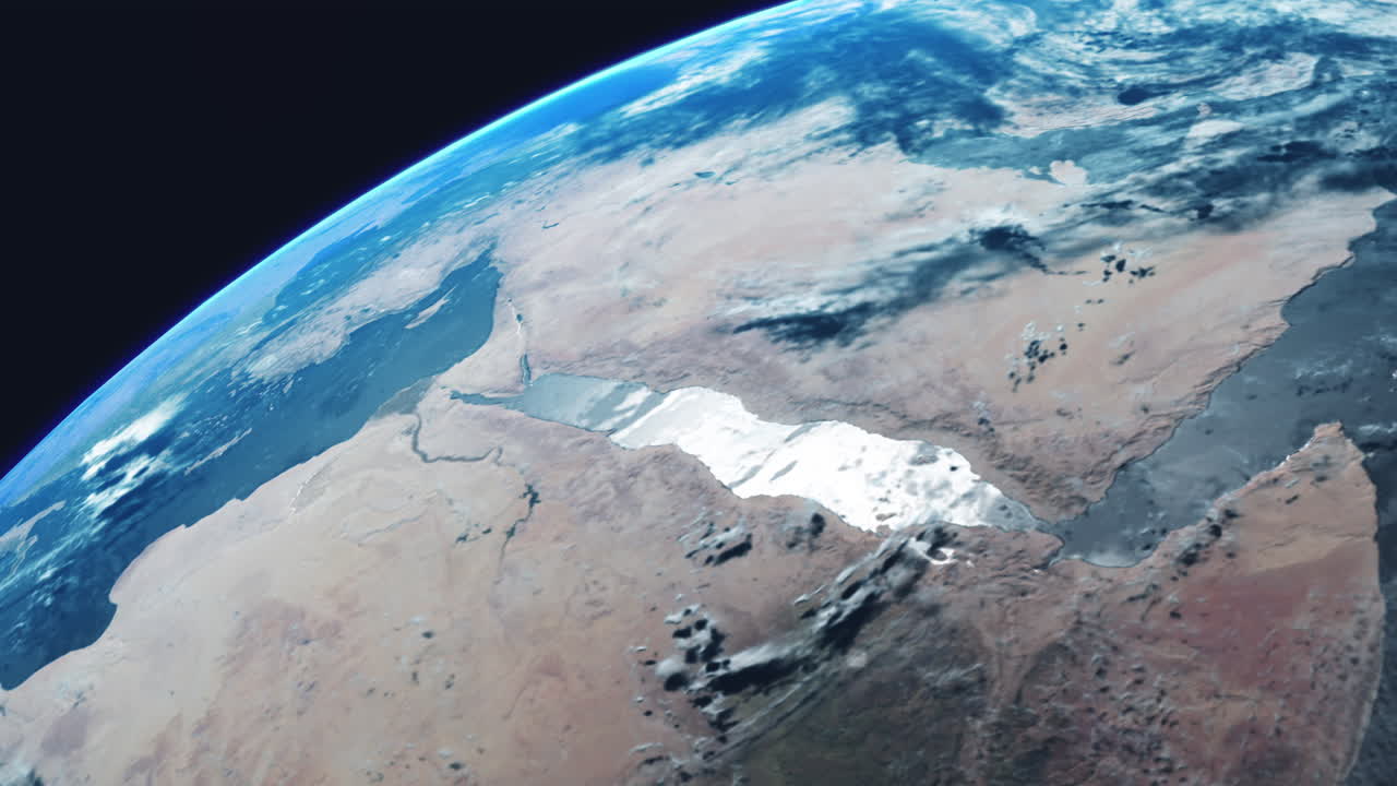 지구가 홍해와 함께 회전하는 우주에서 이집트 북아프리카와 구름 바다 분위기와 바다에 강한 태양 반사와 궤도에서 볼 수 있는 수에즈 운하