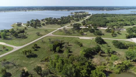 aerial flight over camping spots and promontory park on lake proctor in comanche county in texas