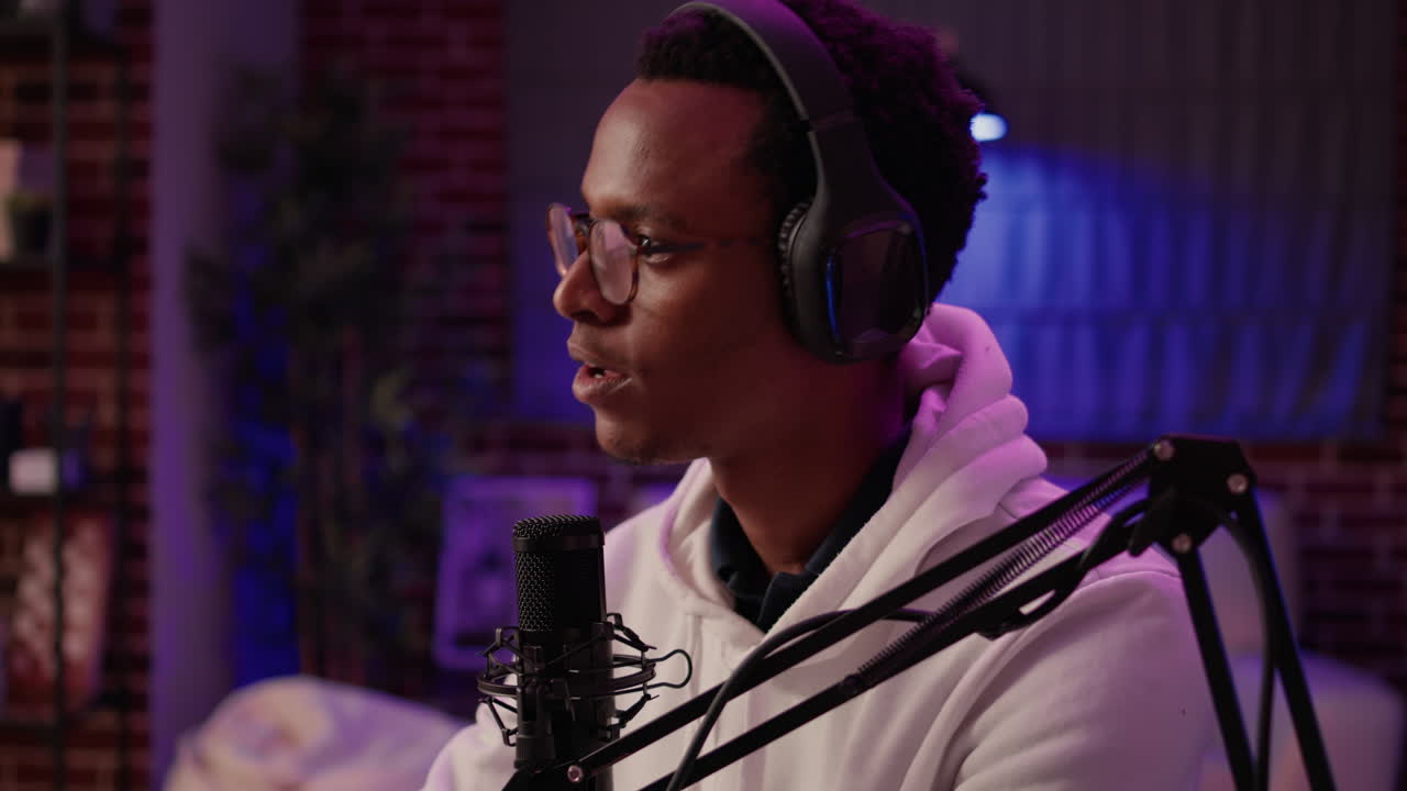 Closeup of podcast presenter reading questions from audience using laptop to woman content creator