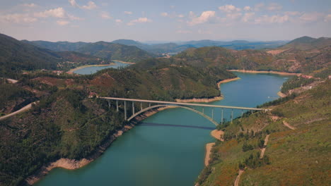 zezere river valley in central portugal with a bridge long drone shot