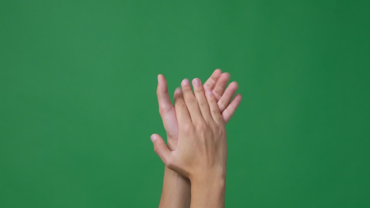 aplaudiendo sobre la pantalla verde