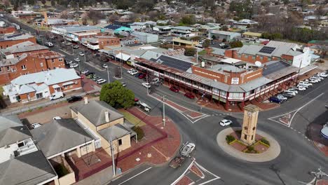 urban traffic flows around clock tower in small australian town