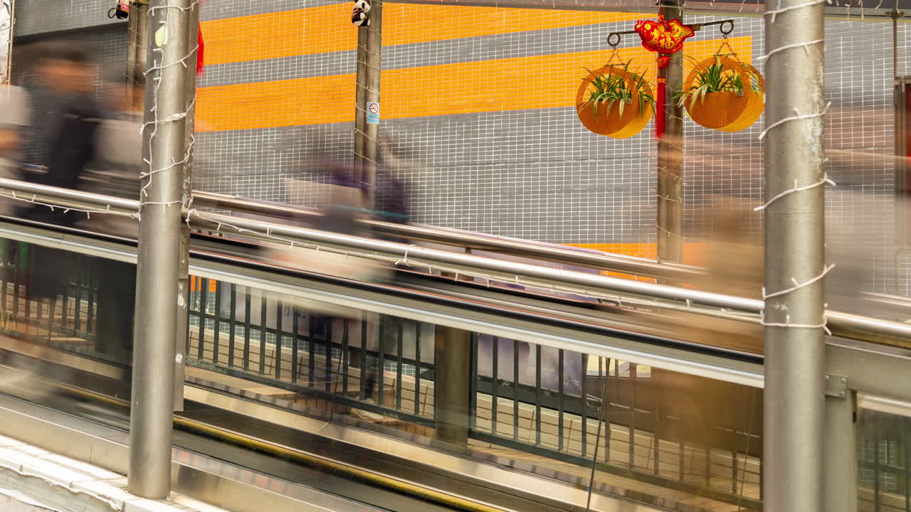 HONG KONG - 19 MARCH 2025 : Timelapse looking down onto a street scene in Hong Kong Central