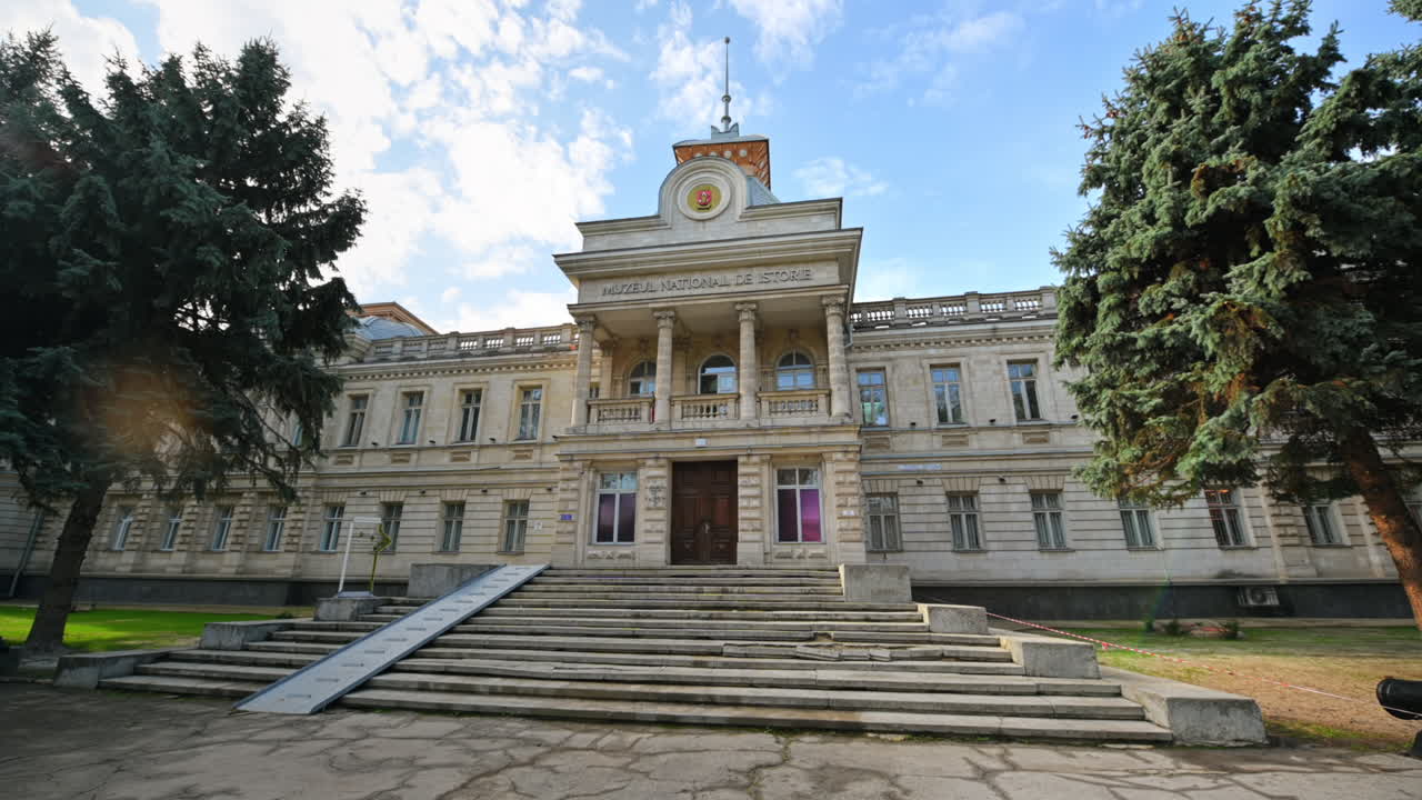 View of the National History Museum of Moldova in Chisinau. Entrance, front yard with greenery