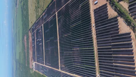 panoramic view of photovoltaic solar panels, dominican republic - vertical shot