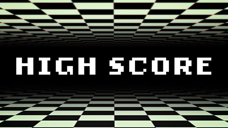 Highscore skrevet med hvidt med sort-hvidt skakternet mønster, der bevæger sig op og ned
