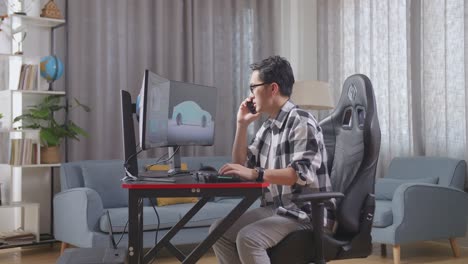 hombre trabajando desde casa en la computadora