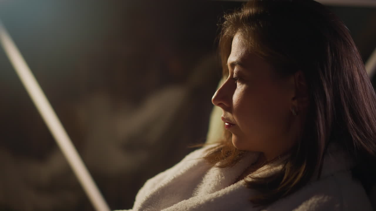 Woman depressed by sad thoughts resting alone in hotel room. Negative thinking and depressive phase in adulthood. Mental problems after difficult divorce