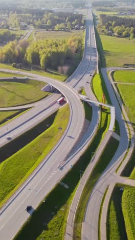 vertical aerial katlakalns highway interchange with moving traffic