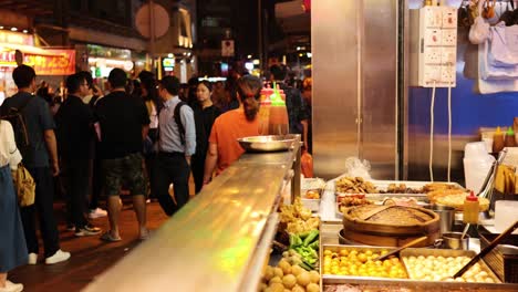 crowds enjoy vibrant street food market