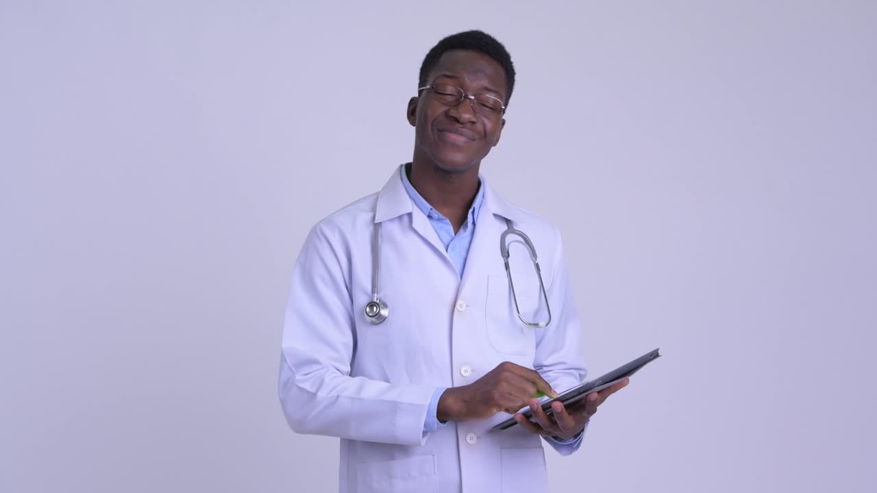 Young handsome African man doctor