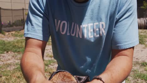 Dog-in-a-shelter-with-volunteer