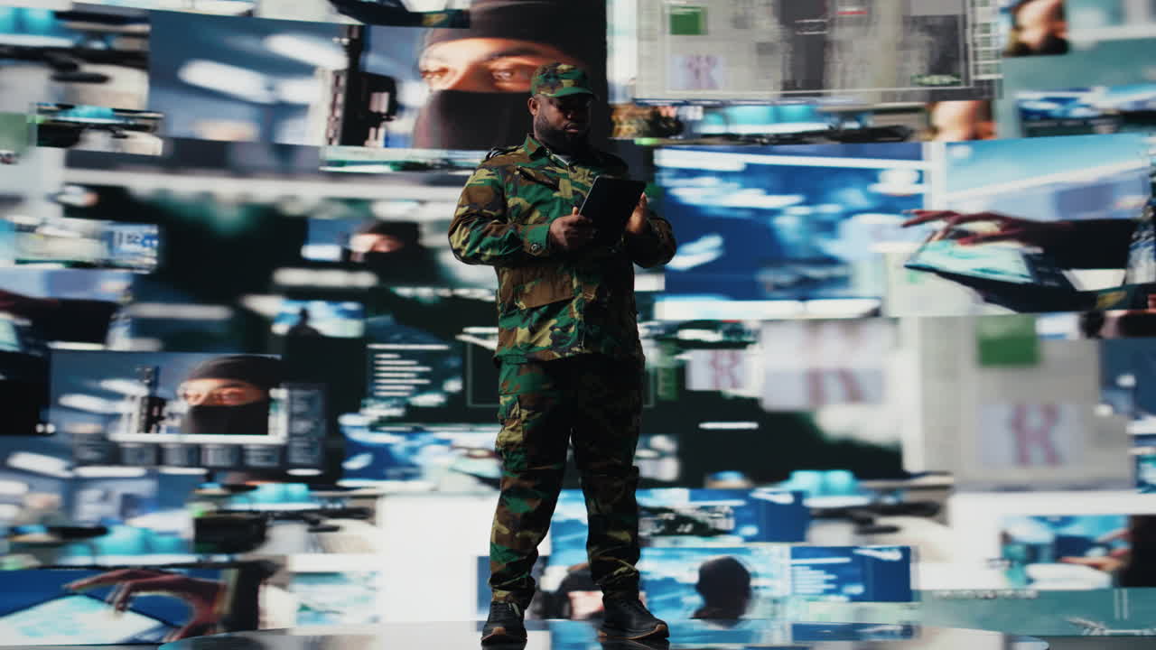 African american soldier works in command center with satellite data