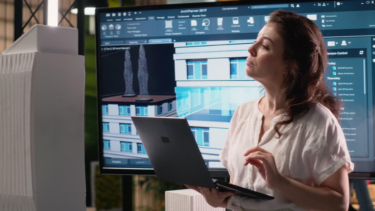 Vertical Video Professional property developer analyzes zoning regulations and project plans