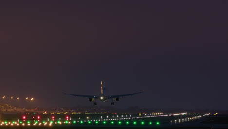 airplane landing at night