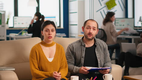 pov of colleagues talking with partners using webcam during video conference