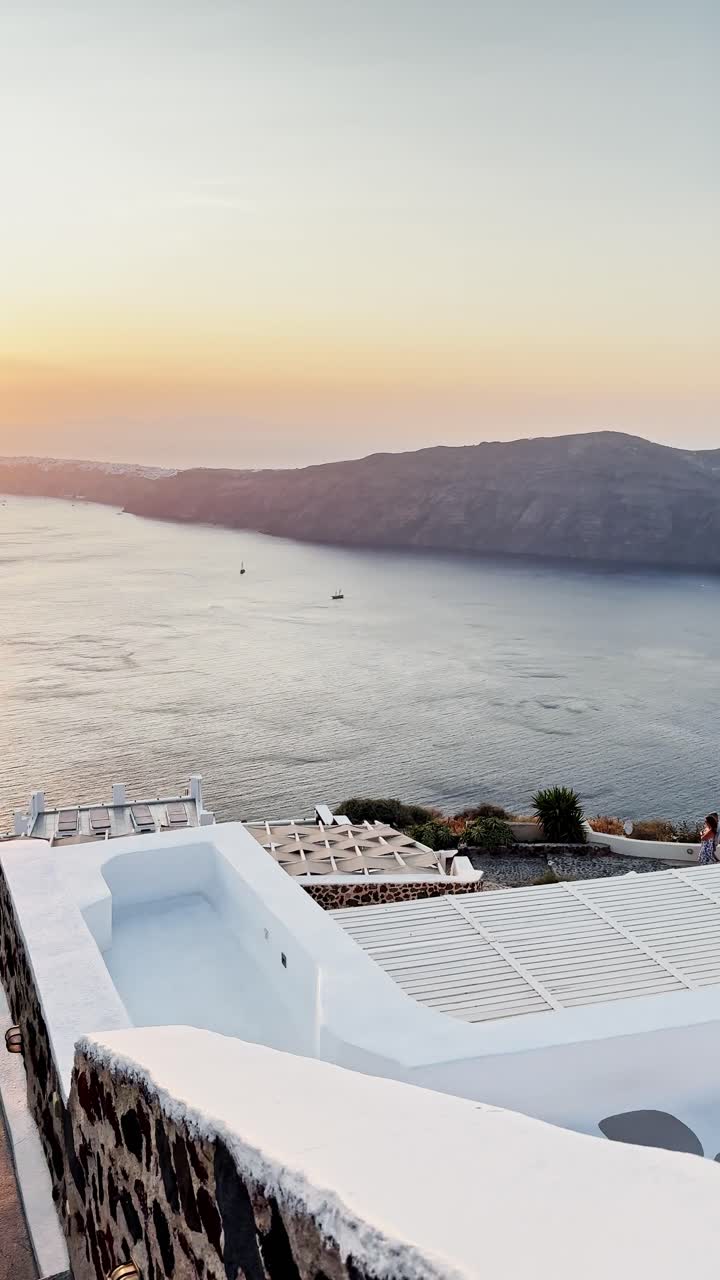 Woman Looking Towards Santorini Caldera at Sunset
