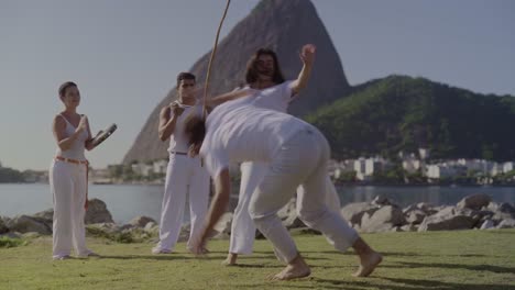 capoeira performance in a scenic outdoor setting in brazil