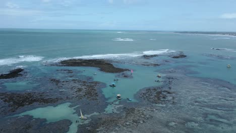 offshore reefs with tropical pools during low tide in maragogi, coral coast, brazil