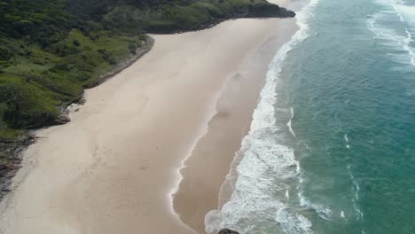dramatic reveal drone shot over fraser island on the east coast of australia