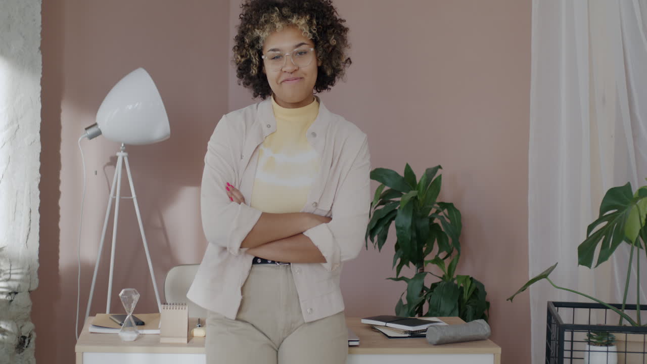 Woman Smiling in Stylish Home Office