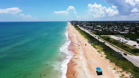 Ormond-Beach,-Florida---Waves-lap-the-shoreline-of-the-beach-along-Route-A1A