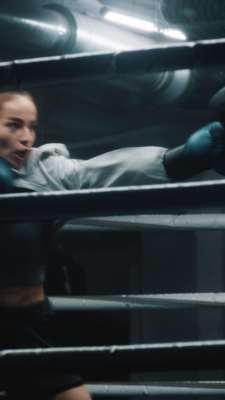Woman Boxer Training in the Boxing Ring