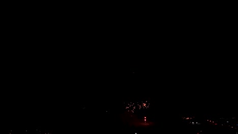 festive fireworks on dark sky during 4th of july - low angle shot
