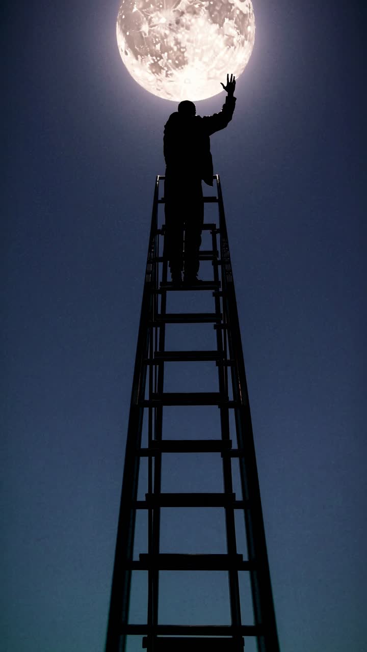 Silhouette of a person on a ladder reaching for the moon, shot from a low angle