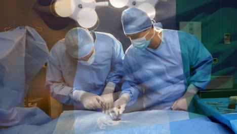 Animation-of-flag-of-nigeria-waving-over-surgeons-in-operating-theatre