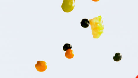 fruit salad falling against white background 4k