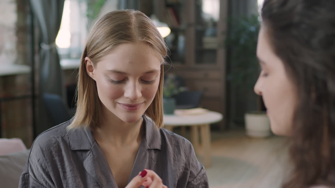 Young Woman Smelling Strawberry Body Butter