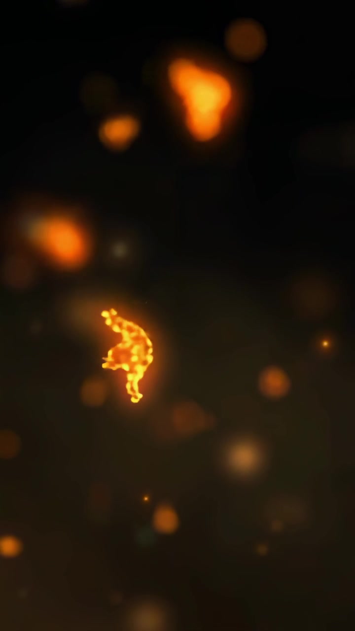 Floating Glowing Orange Particles and Embers on Black Background