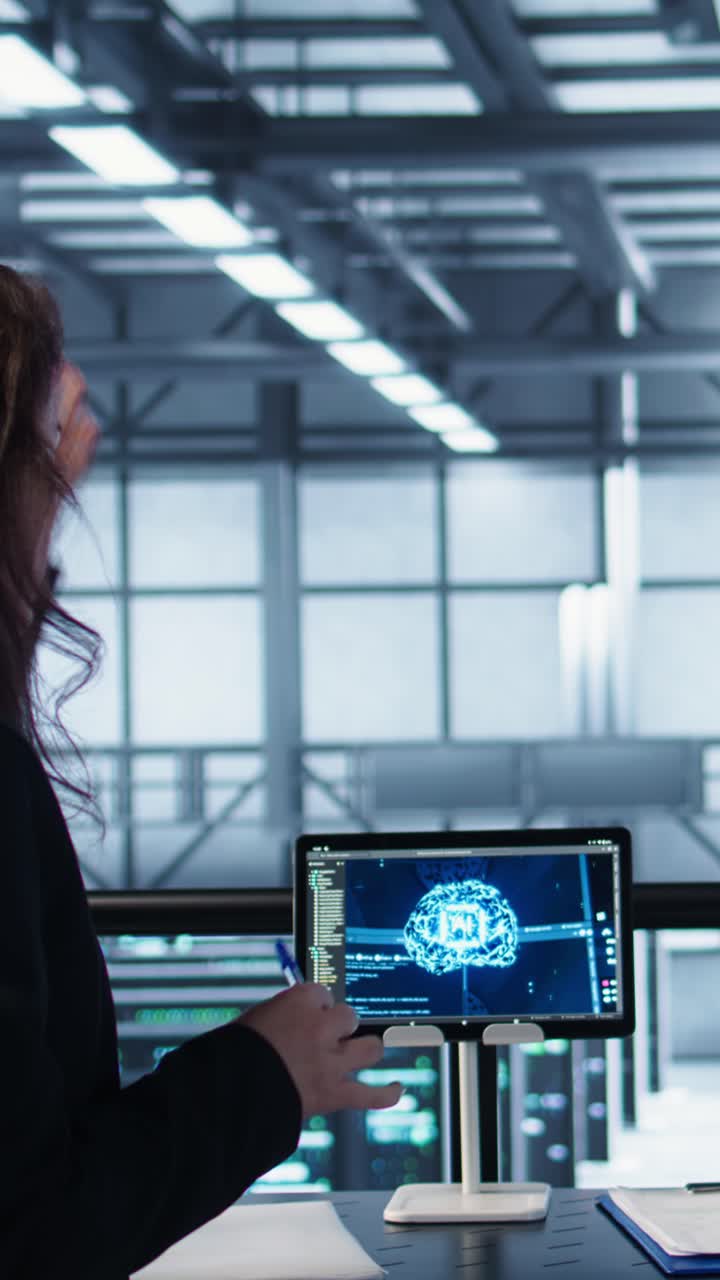 Vertical video Team of engineers in data center with tablet integrating AI automation tools