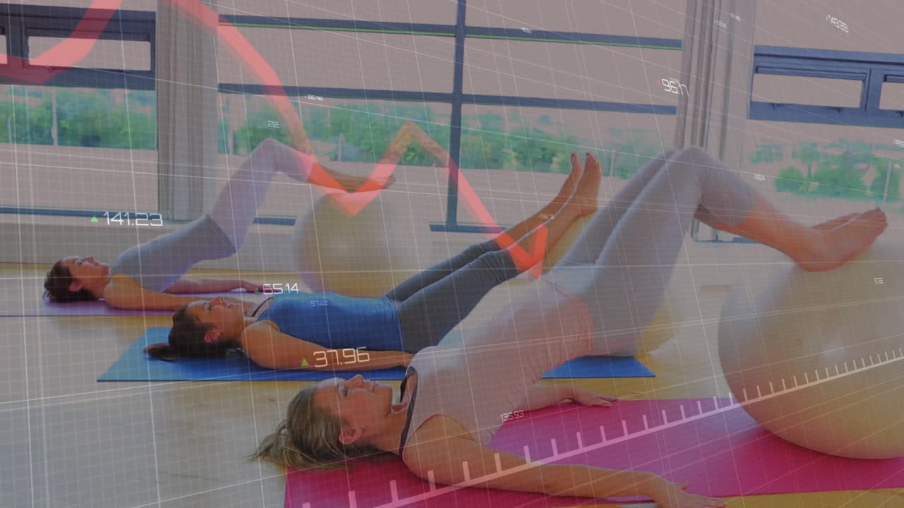 three women performing glute bridges on stability balls in fitness studio, showing animated metrics