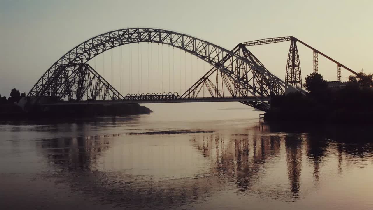 View Of Lansdowne  And Ayub Bridge Over Indus River During Evening Light. Aerial Follow Shot