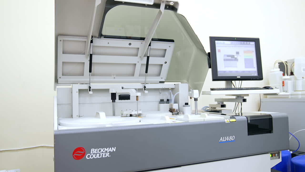 Innovative medical testing apparatus works in the biomedical laboratory. Equipment for modern blood test analysis in advanced clinics.