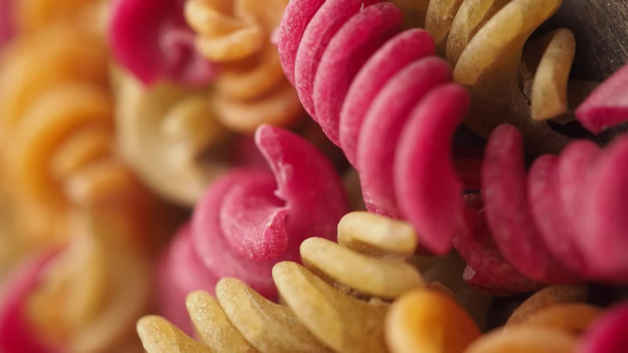 Close-up of Colorful Uncooked Fusilli Pasta
