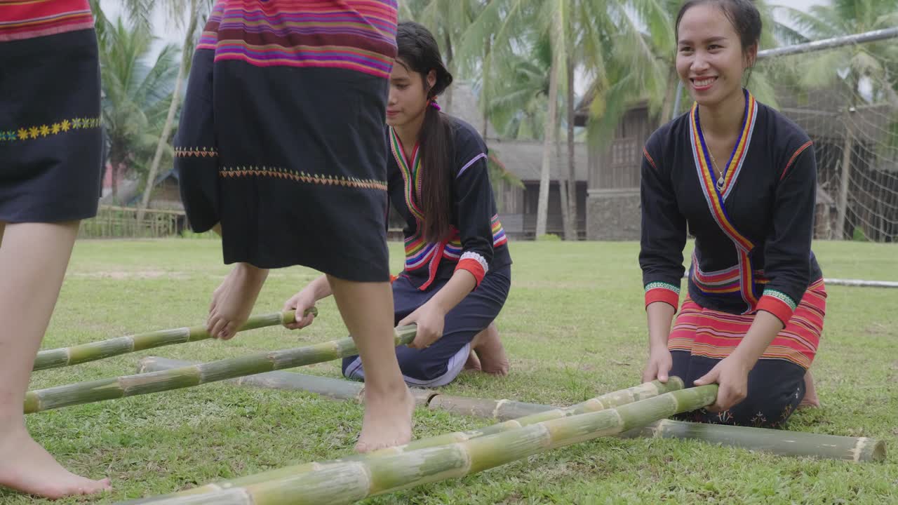 Ethnic Minority Women Performing Traditional Bamboo Walking Dance