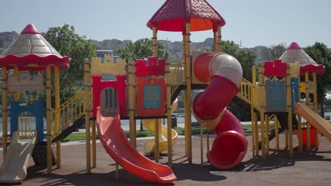 colorful playground with slides and climbing frame