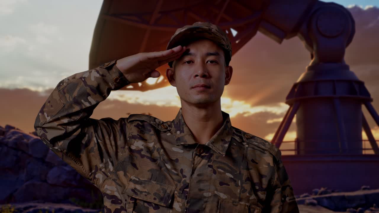 Close Up Of Asian Man Soldier Saluting While Standing With Satellite Dish