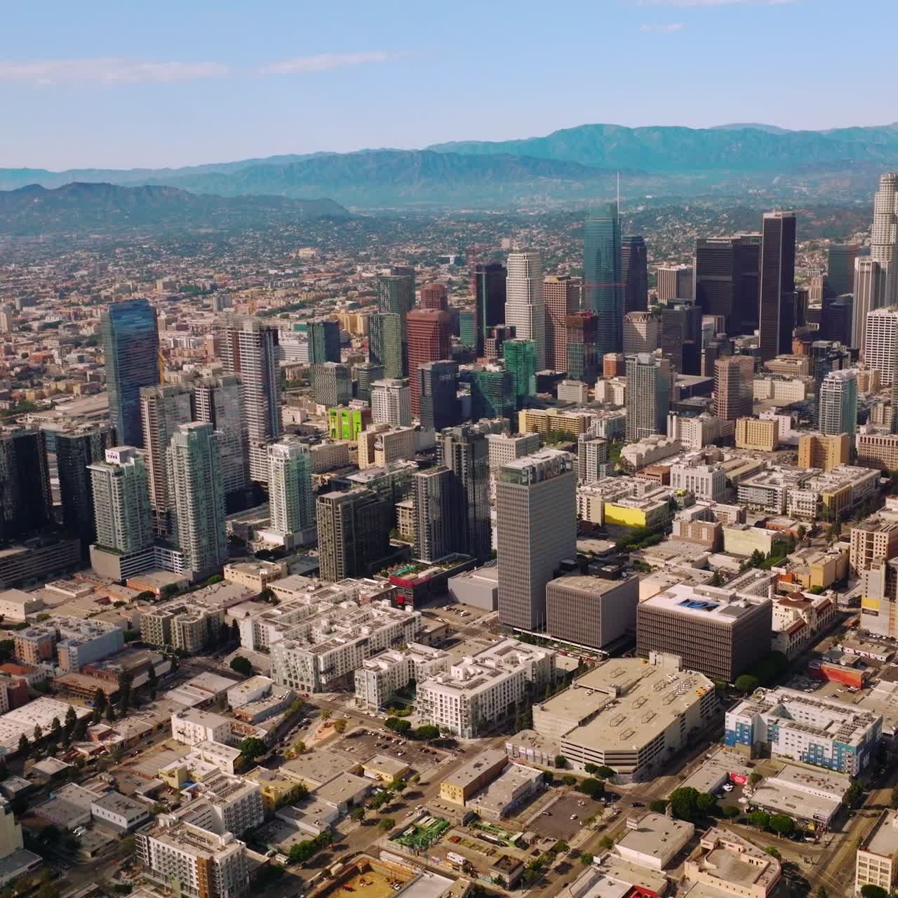 Los-Angeles aerial shot with skyscrapes. Sunny urban american city