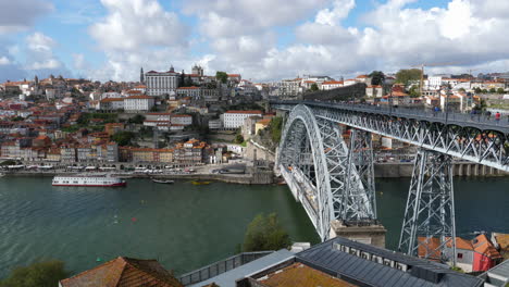 Porto-City-With-Douro-River-And-Dom-Luis-Bridge-With-Cloudy-Sky-In-Portugal---static-shot