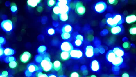 abstract aislado borroso festivos amarillo naranja luces con bokeh. concepto de vacaciones telón de fondo con brillantes formas brillantes. parpadeantes luces de árbol de navidad