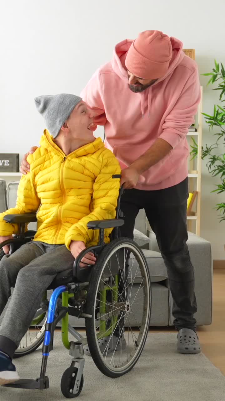 Man in Wheelchair with Assistant