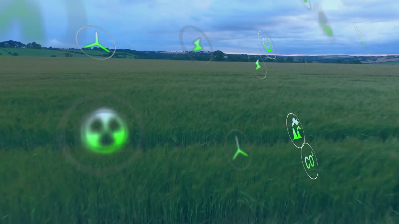 Green agricultural field being animated in flat design, featuring floating green energy icons