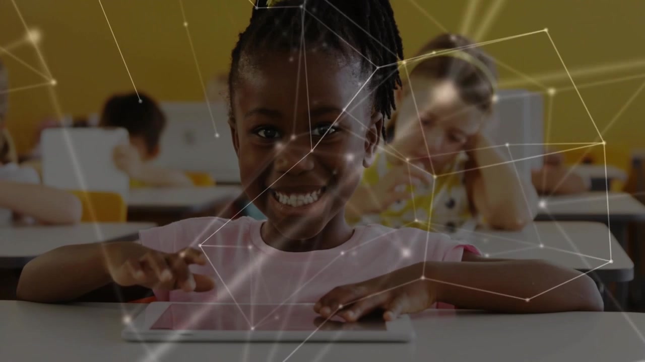 Girl tapping tablet in classroom and activating network overlay, learning confidently and smiling