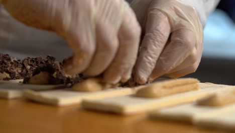 The-French-pastry-chef-adds-chocolate-filling-to-dinish-desserts