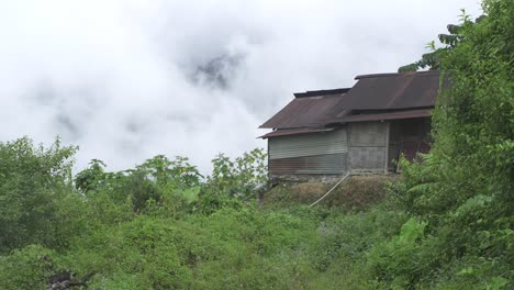 the mountains are covered with clouds